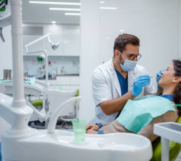 dentist performing a checkup on patient