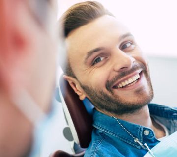 a perfect result of a dentists work which is seen in the beautiful and white smile on a