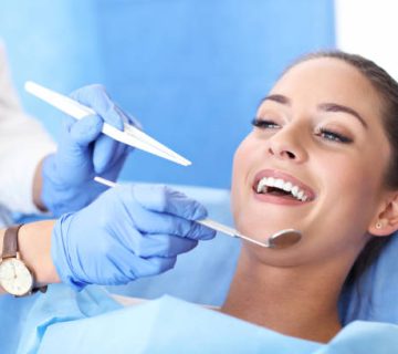 adult woman having a visit at the dentists
