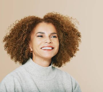 close up studio portrait of beautiful middle age woman 50 55 years old african american lady
