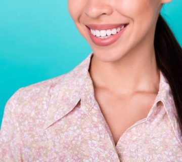cropped close up photo of cheerful positive girl toothy beaming smile isolated on turquoise 1