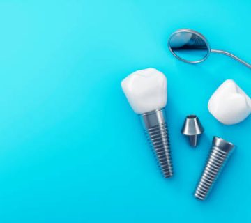 dental implants isolated on blue background
