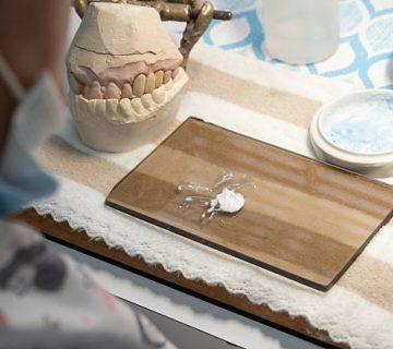 dental technician at work in a laboratory setting