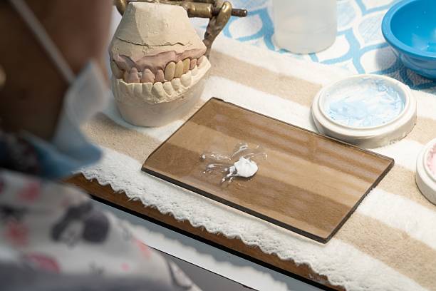 dental technician at work in a laboratory setting