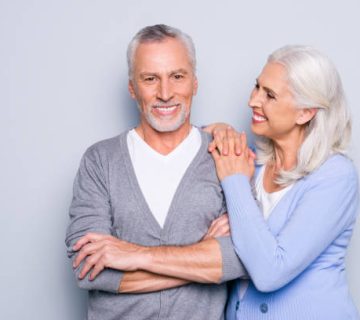 happy excited lovely tender gentle cute elderly people are smiling and embracing isolated on