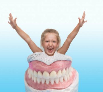 happy smiling girl with dentist tool