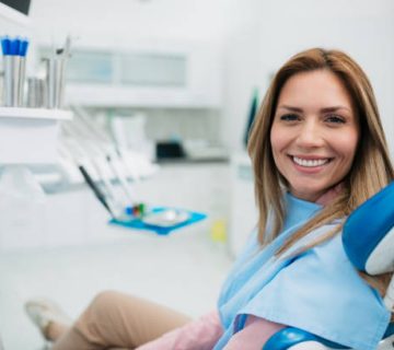 happy woman visiting a dentist office 2