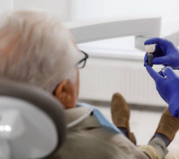 oral care treatment for a old man patient came for a visit to the dentist he laying down on