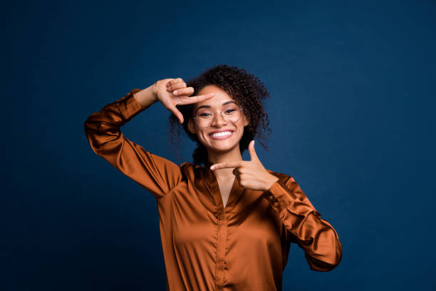 photo of good mood funny lady wear silk brown shirt spectacles showing arms photo gesture