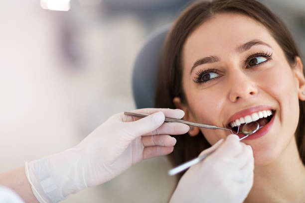 woman having teeth examined at dentists 3