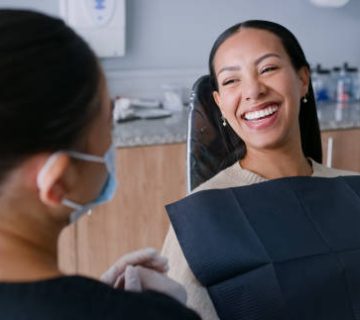 women dentist and patient with smile wellness and oral health consultation and check mouth 3