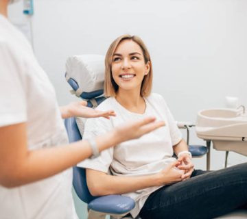 young charming lady sit in dentist office