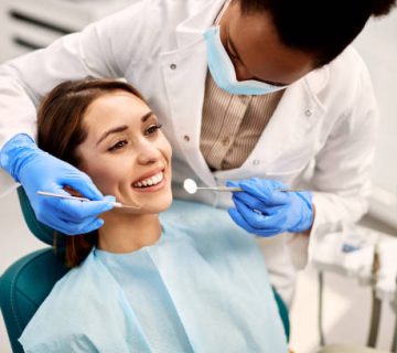 young happy woman during dental procedure at dentists office 3